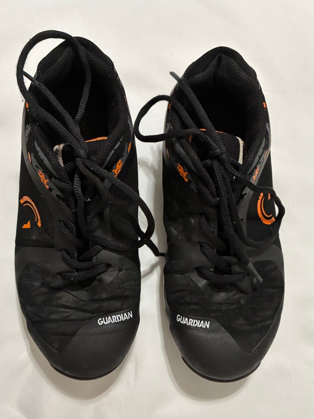 Guardian youth size 5 Turf shoes. Lots of life left. Some scuffing